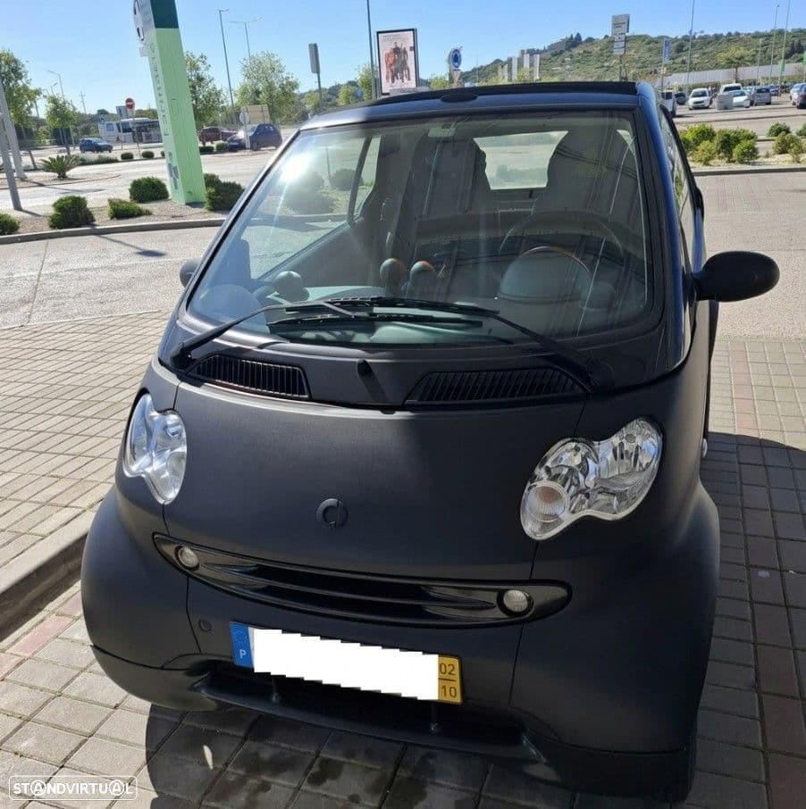 Smart Fortwo Cabrio Passion, com patilhas no volante.